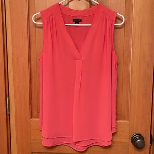 Ann Taylor sleeveless pleated front V neck flowing tangerine blouse. Size M.